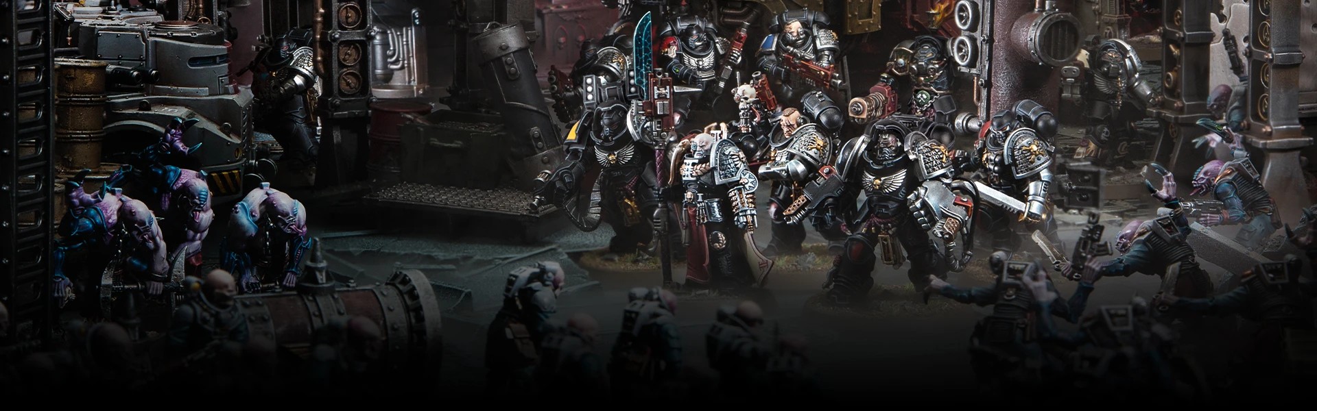 Deathwatch face off against Genestealers in an industrial complex