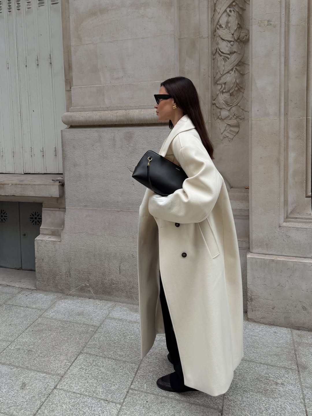 Johanna Piispa wearing a white Rohe coat.