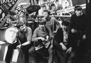 Under the gun, The Animals on the set of the TV show 'Ready Steady Go!' in 1963