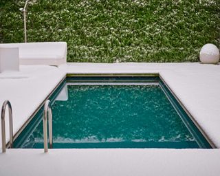 small swimming pool in the snow