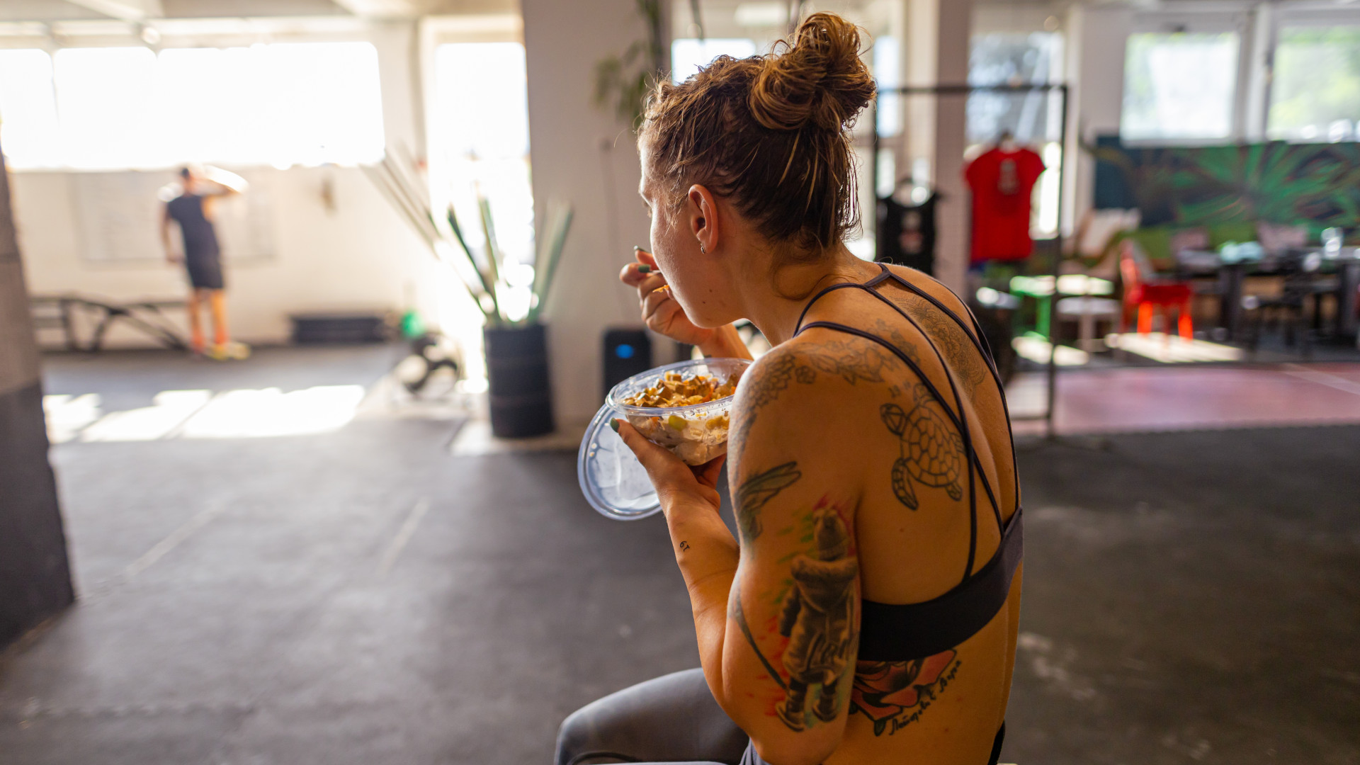A woman eating after workout