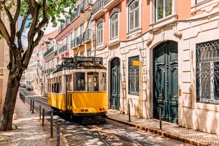 image of yellow tram in Portugal