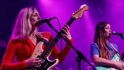 Wet Leg performing on stage. 