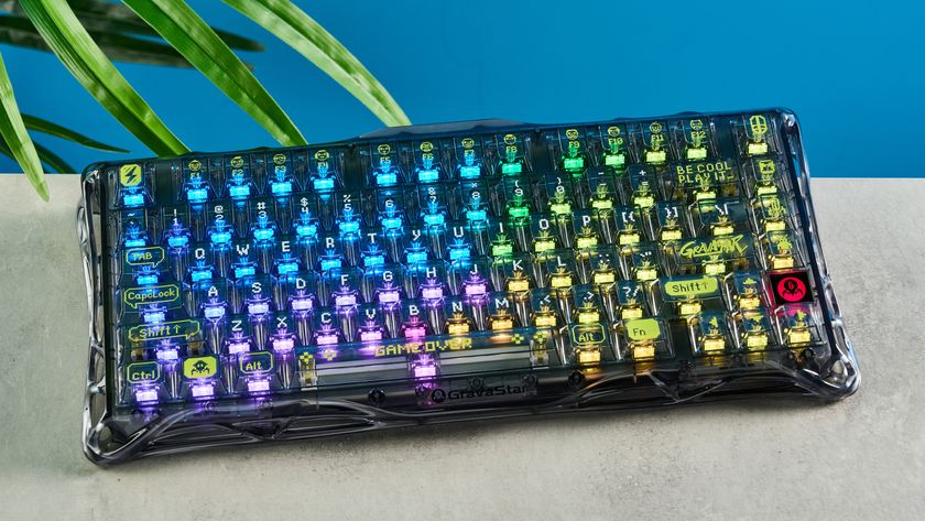 A GravaStar Mercury K1 Lite mechanical keyboard with shine-through keycaps