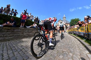 GERAARDSBERGEN BELGIUM SEPTEMBER 05 Toms Skujins of Latvia and Team Trek Segafredo competes for the Wall of Geraardsbergen Mur de Huy during the 17th Benelux Tour 2021 Stage 7 a 1809km stage from Namur to Geraardsbergen BeneluxTour on September 05 2021 in Geraardsbergen Belgium Photo by Luc ClaessenGetty Images