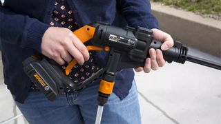 The WORX Hydroshot WG629 being held in someone's hands