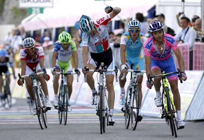 De Clercq celebrates with one arm in the air