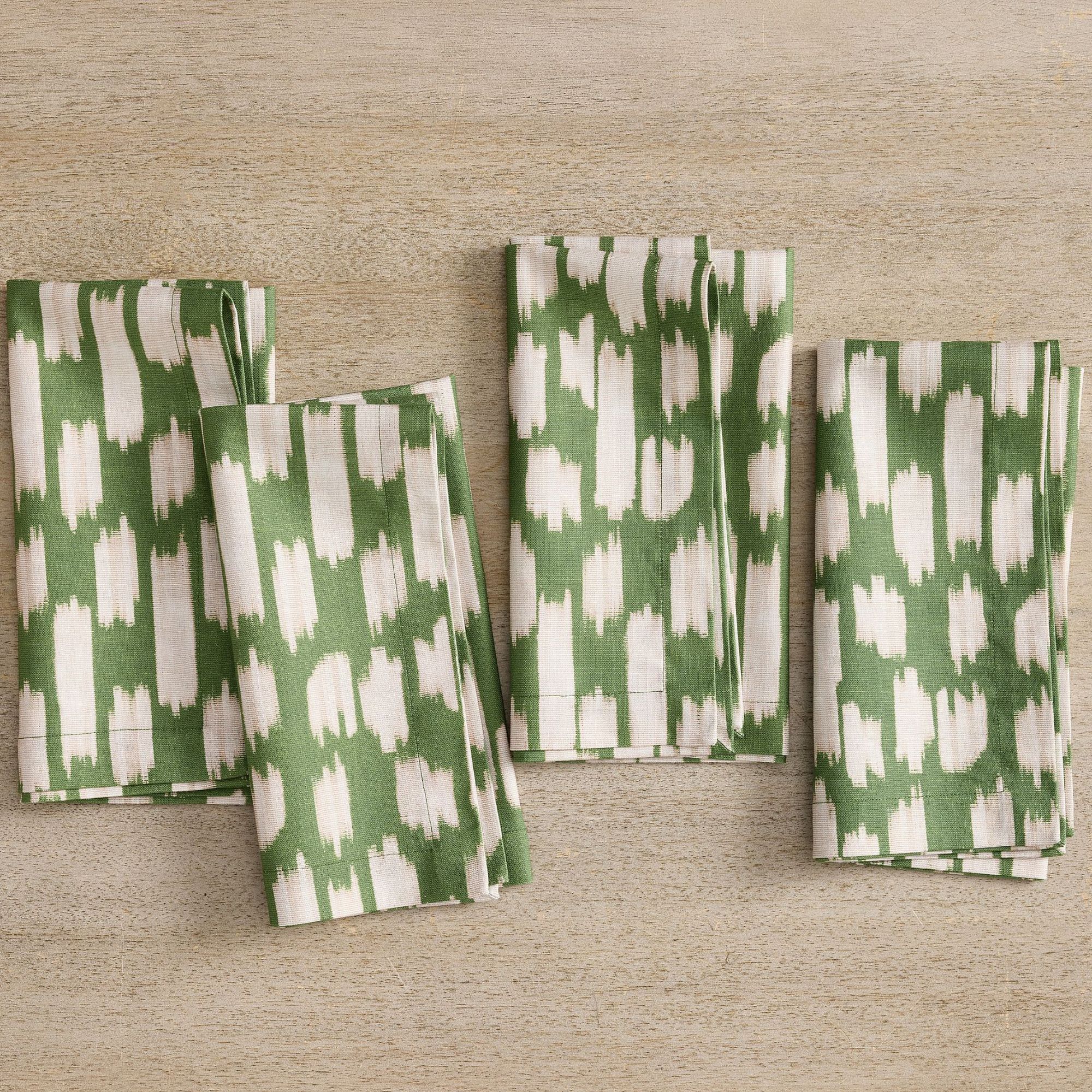 Green napkins with white geometric print