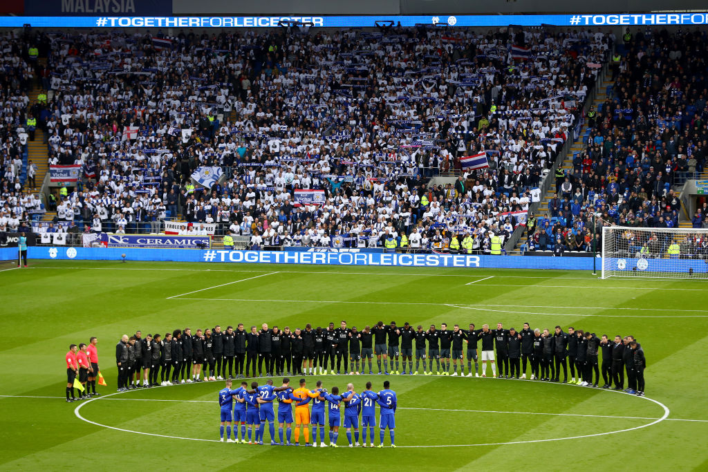 Players line up around the centre circle for a minute's silence for Vichai Srivaddhanaprabha and Armistice day prior to the Premier League match between Cardiff City and Leicester City