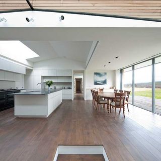 open plan kitchen diner with vaulted ceiling