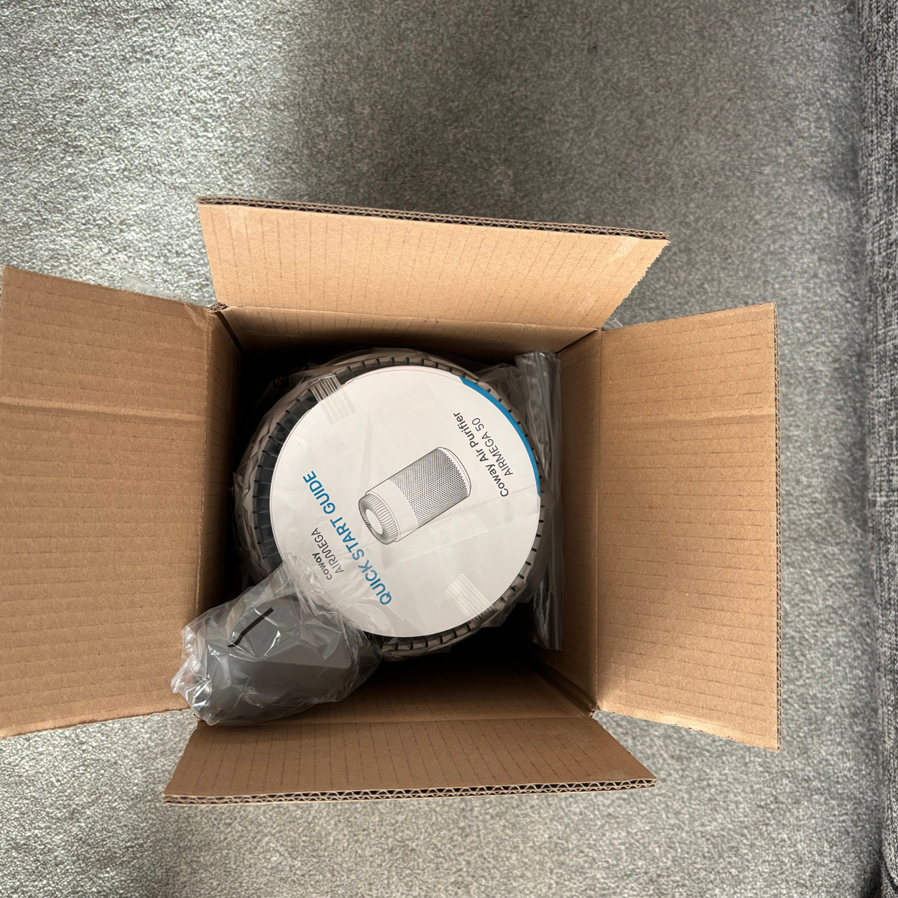 Coway Airmega 50 unboxing process