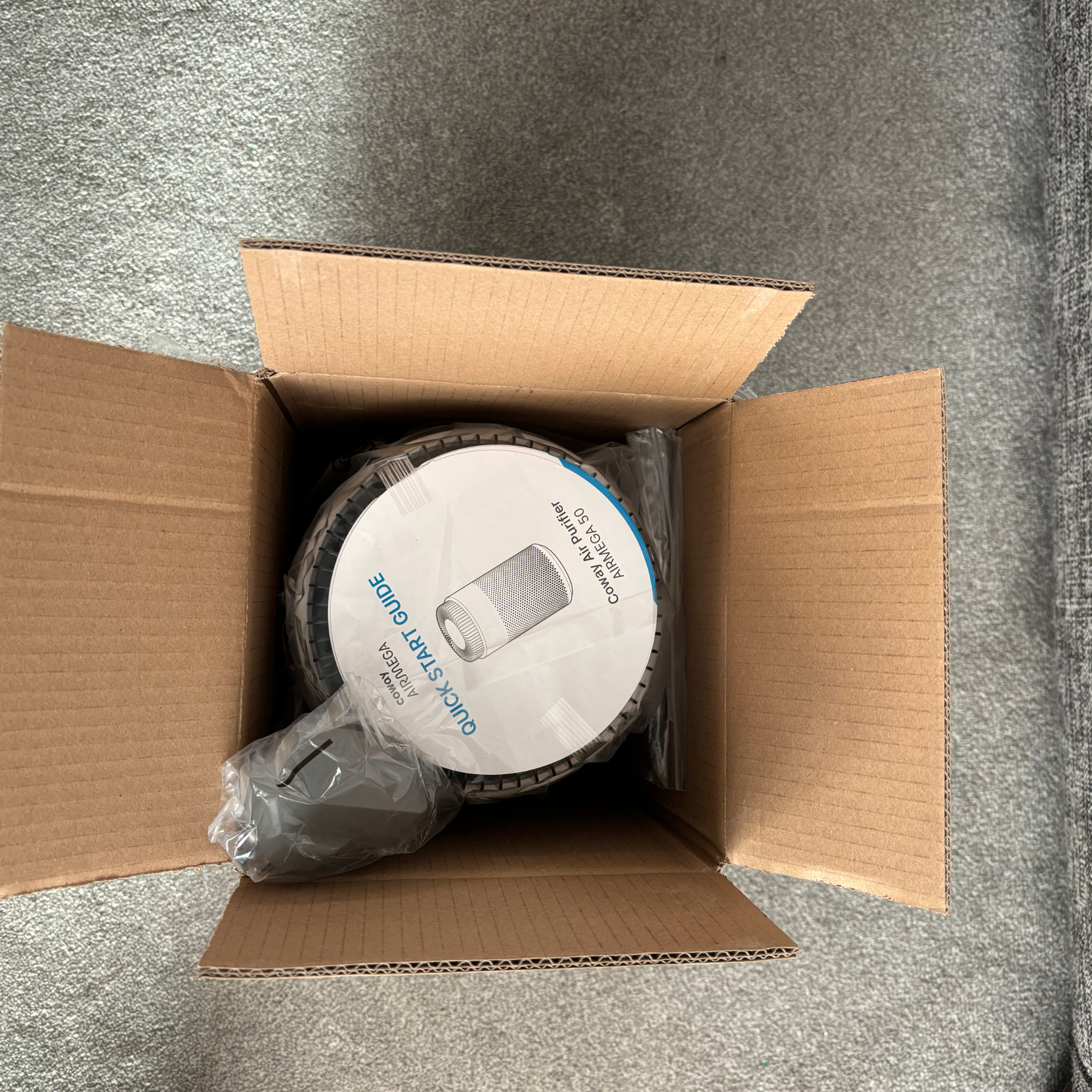 Coway Airmega 50 unboxing process