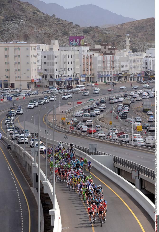 The peloton races at the Tour of Oman