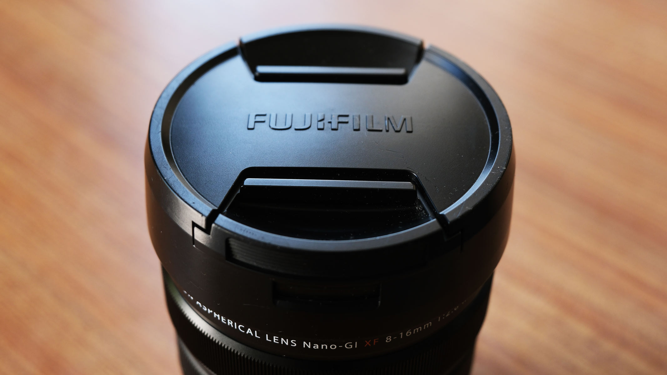 The Fujifilm XF 8-16mm f/2.8 lens with the lens cap attached