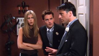 Rachel (Jennifer Aniston) and Chandler (Matthew Perry) look at Joey (Matt LeBlanc) in the Friends episode "The One After Ross Says Rachel."