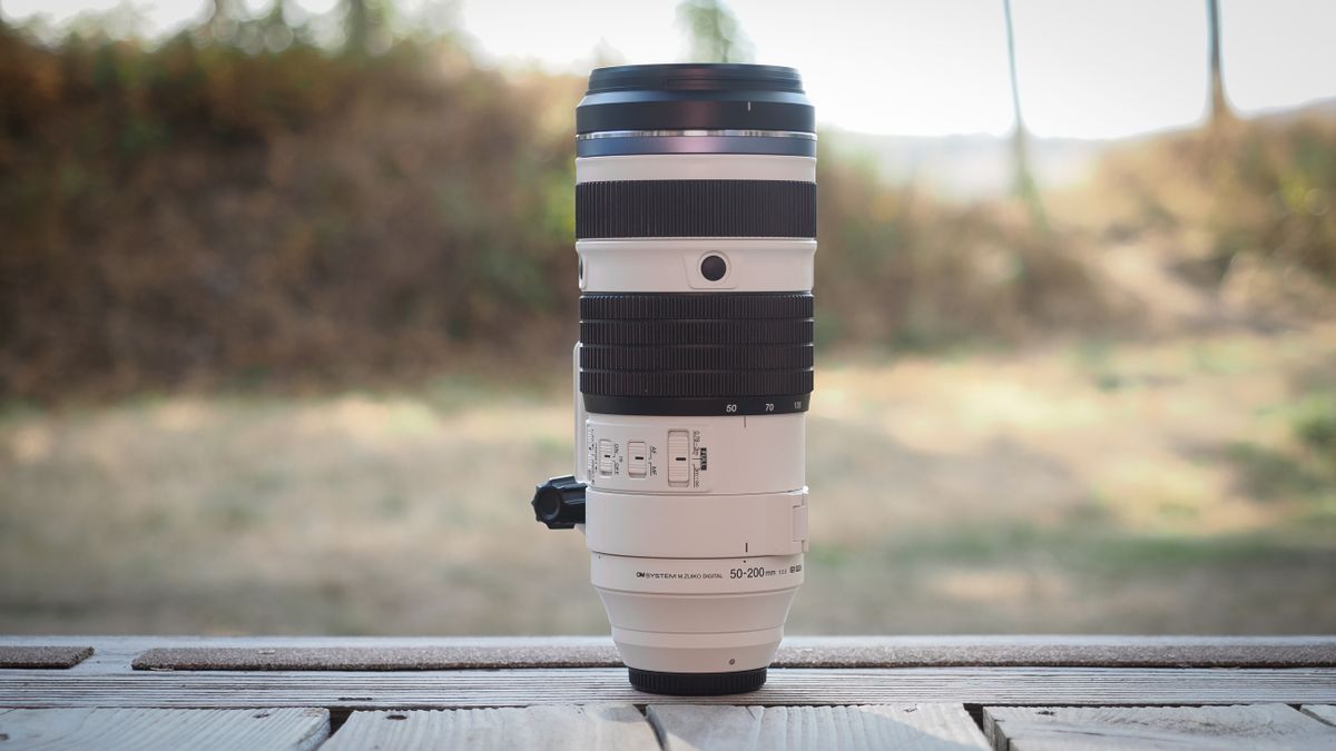 The OM System M.Zuiko 50-200mm f/2.8 IS Pro lens, mounted to the OM System OM-1 Mark II, in an outdoor setting
