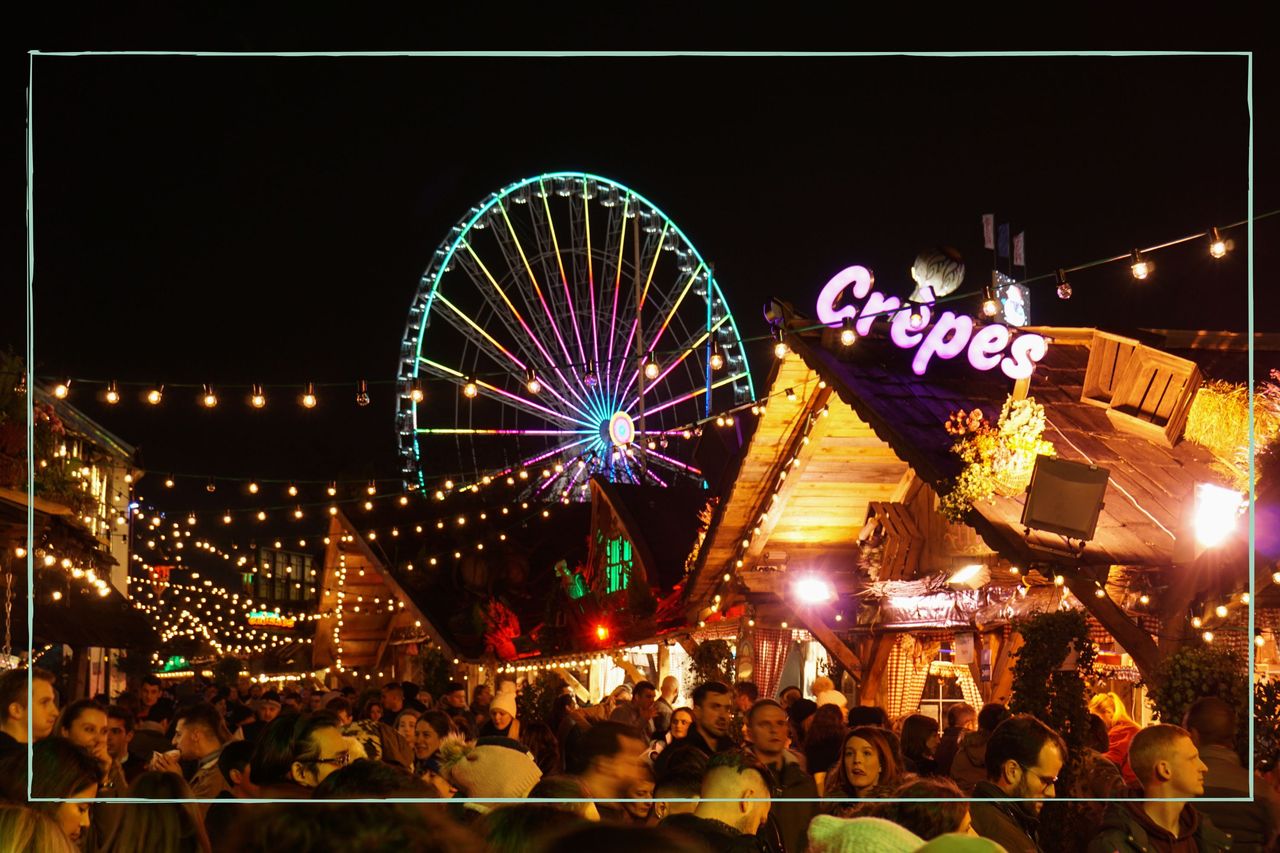 A photo of the crowd and the big wheel at Hyde Park&#039;s Winter Wonderland