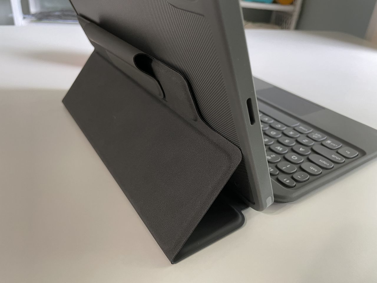 Zagg Pro Keys With Trackpad Wireless Keyboard With Trackpad And Detachable Case High Angle Lifestyle