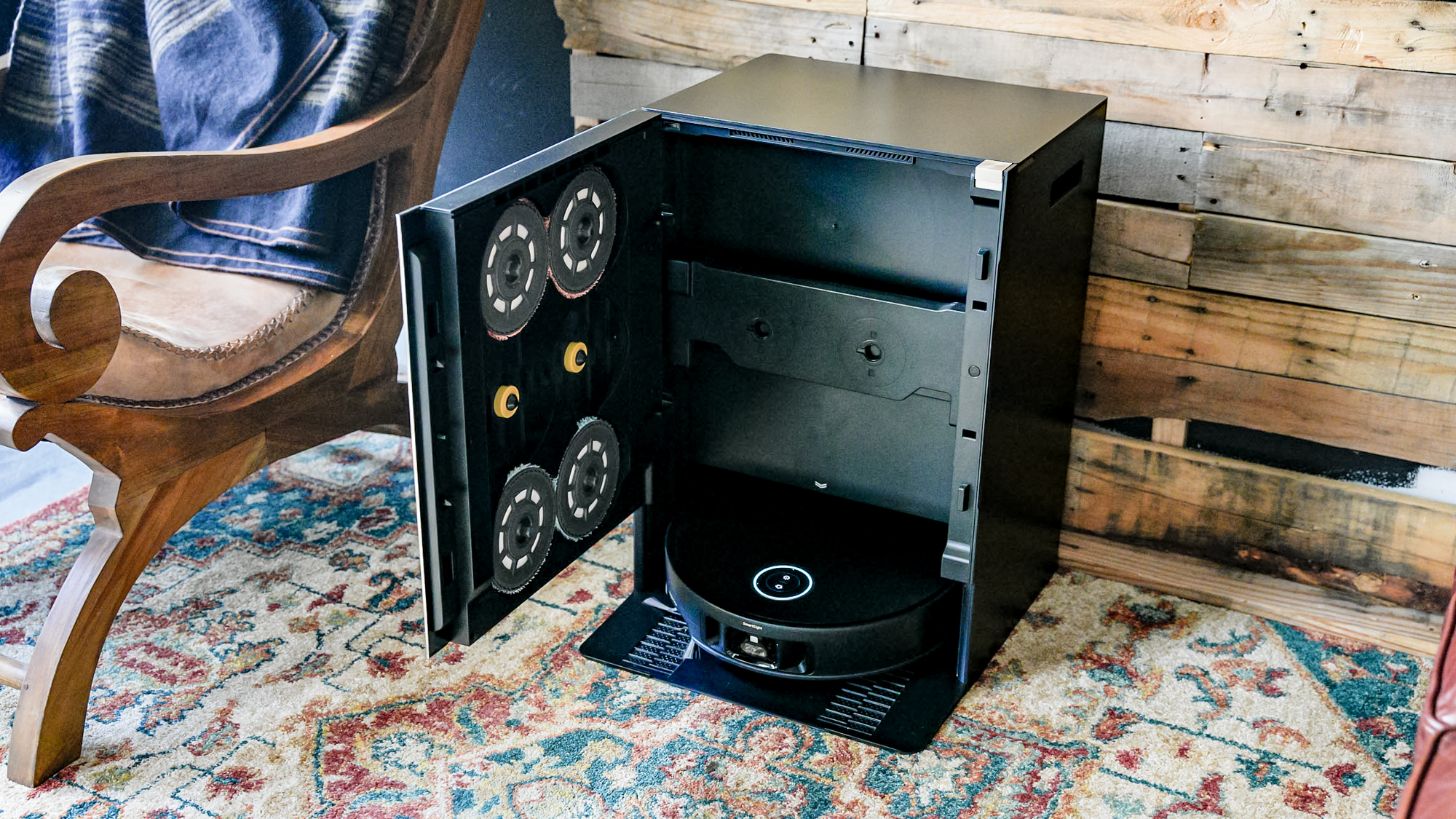 Mova Mobius 60 robot vacuum docked in the base station