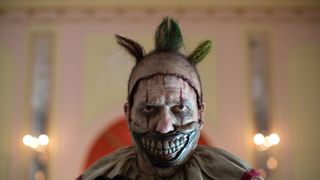 <p>Twisty, the mouthless, nightmare-inducing clown, approaches a sweet, naive couple in a park for hands down the most terrifying scene of the series. Twisty picks up a juggling pin and proceeds to beat the boy to a bloody pulp. </p>