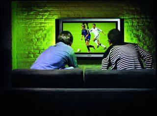 A bit exxagerated in this promotional shot, but Ambilight aims to extend the TV picture beyond the edges of the plasma screen.