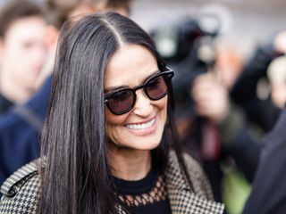 Demi Moore smiles for the camera