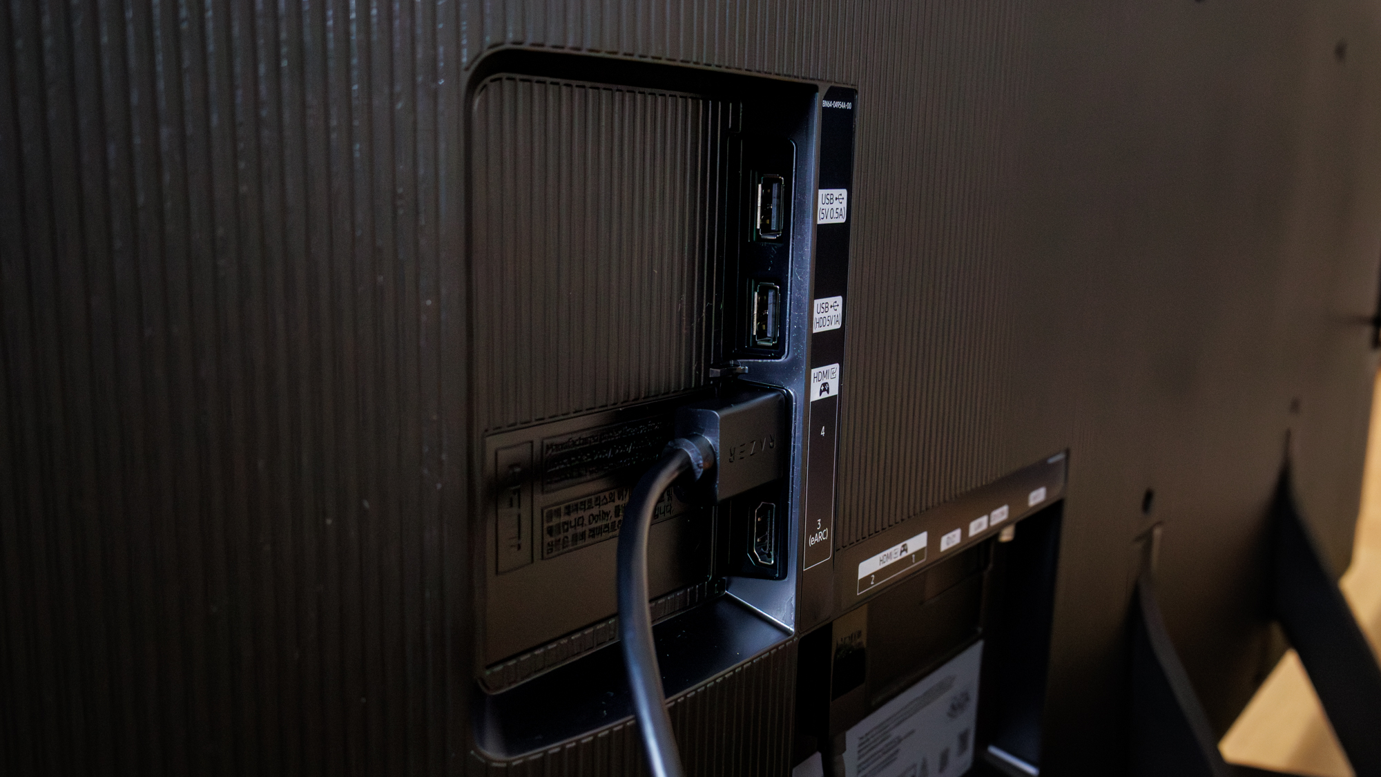 Samsung OLED S85F TV on a table