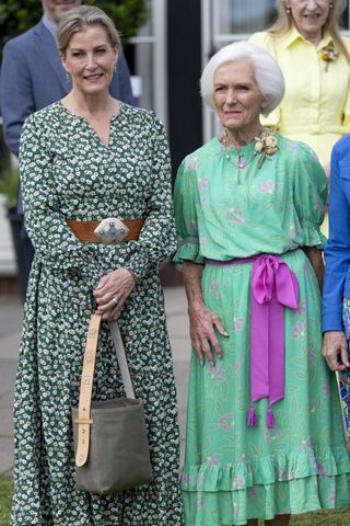Sophie, Duchess of Edinburgh and Mary Berry view and try some of the cakes and breads on display during a visit to the Royal Windsor Flower Show at Windsor Great Park on June 8, 2024 in Windsor, England