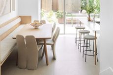 open plan kitchen and dining are with modern grey dining chairs