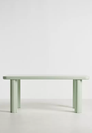 Mint green dining table from Anthropologie.