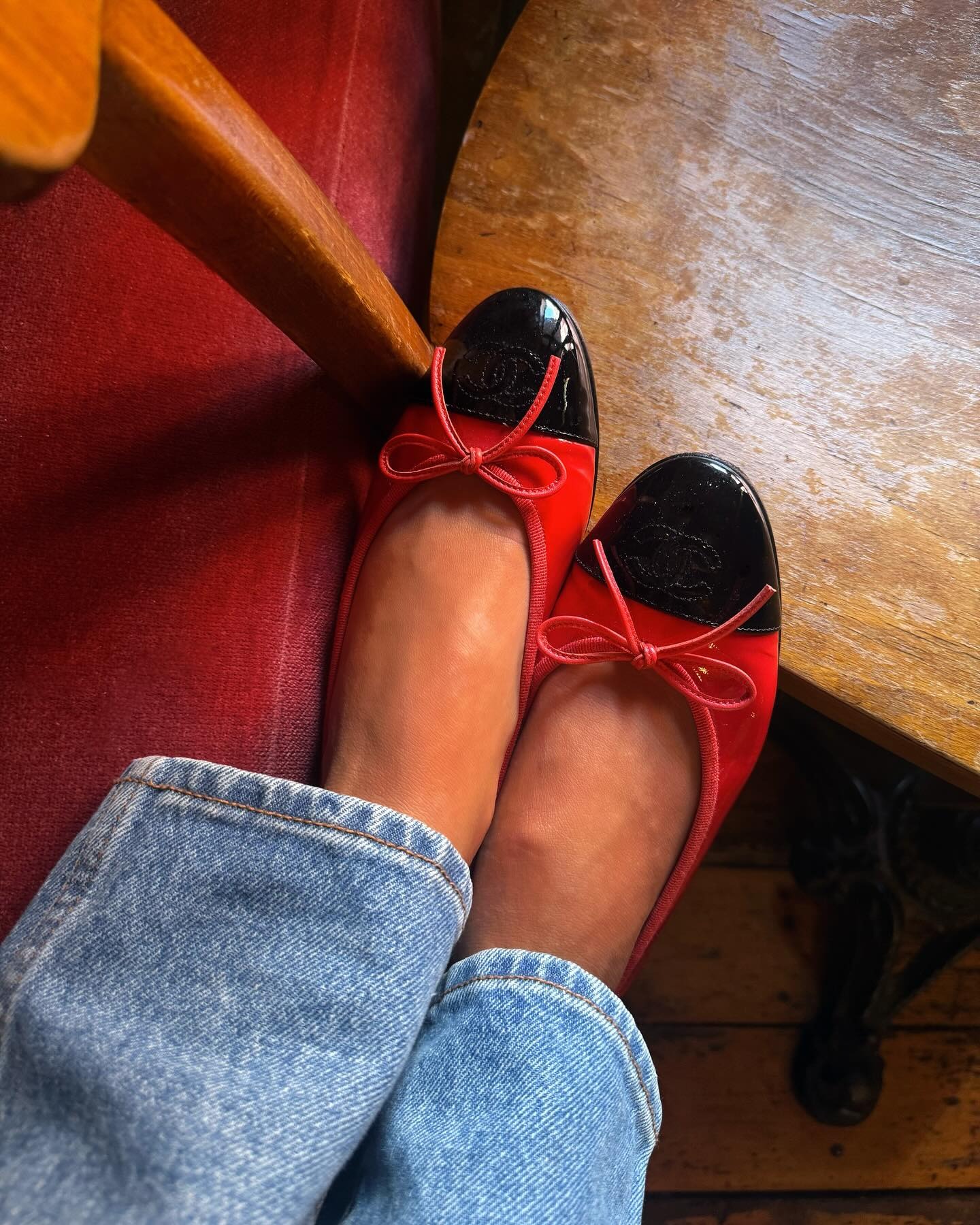 Influencer Emili Sindlev wearing red patent leather Chanel Flats