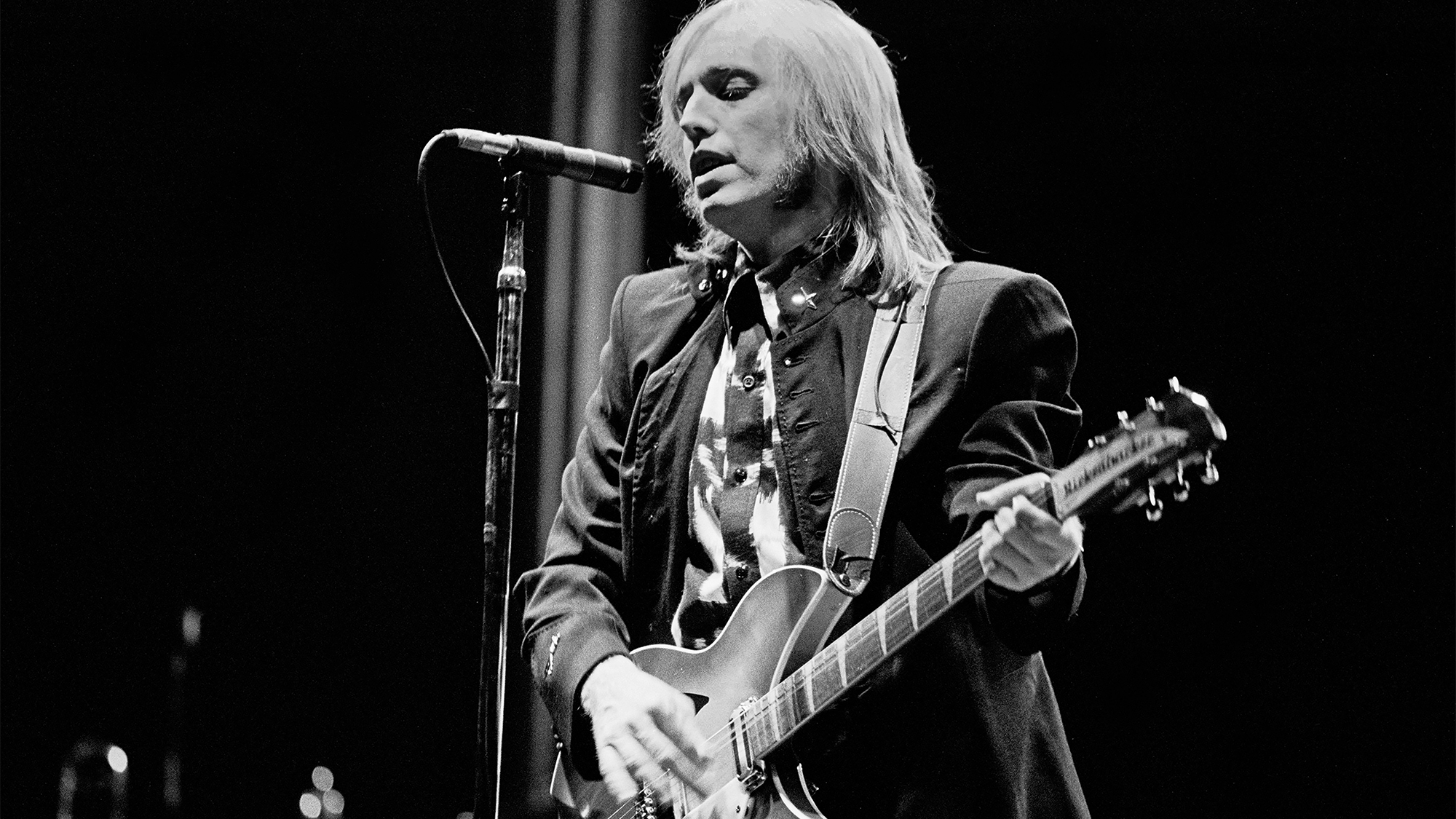 American Rock and Pop musician Tom Petty (1950 - 2017) plays electric guitar as he performs, with his band the Heartbreakers, during the &#039;Southern Accents&#039; tour at Brendan Byrne Arena (later known as Meadowlands Arena), East Rutherford, New Jersey, June 15, 1985.