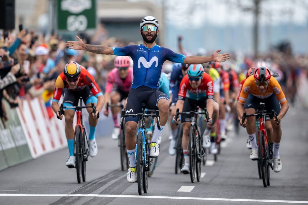 Colombian Fernando Gaviria celebrates after winning the final stage of the Tour de Romandie UCI cycling World tour 1708 km from VufflenslaVille to Geneva on April 30 2023 Photo by Fabrice COFFRINI AFP Photo by FABRICE COFFRINIAFP via Getty Images