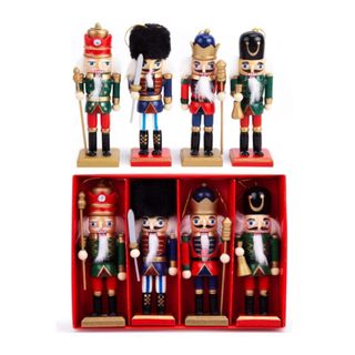 Four colorful Nutcracker ornaments and four in a red box