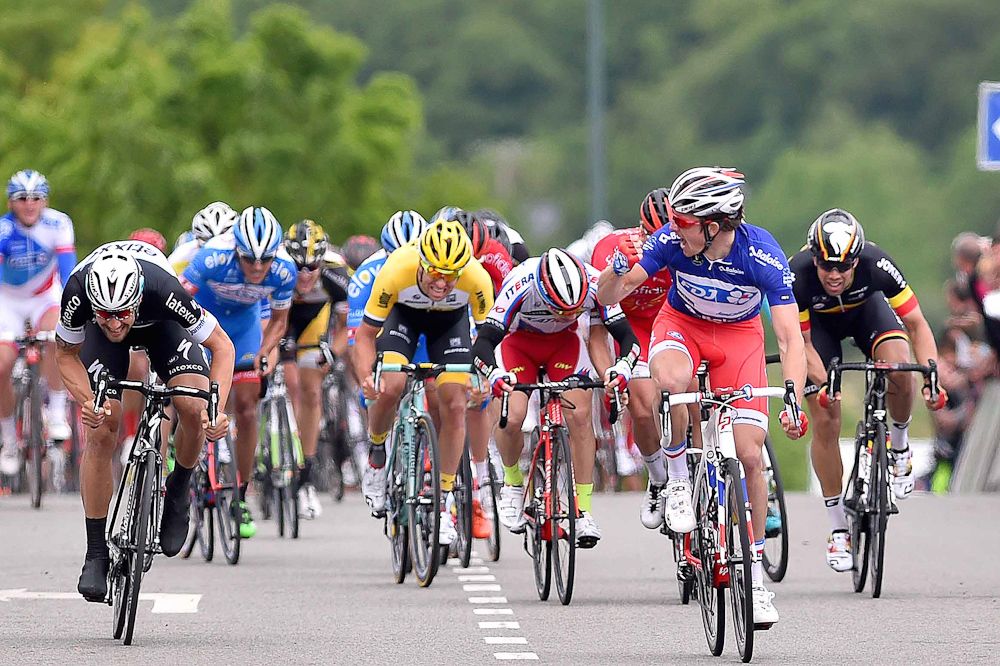 Arnaud Demare looks across to Tom Boonen after winning stage 3 in Belgium.
