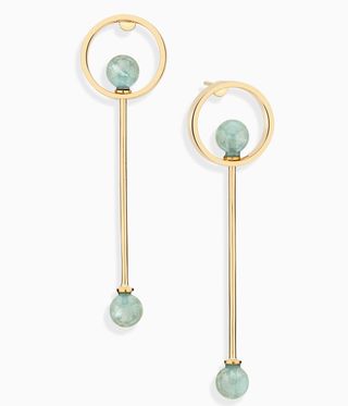 Gold dangle earrings with aquamrine stones