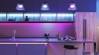 A kitchen with relaxing purple mood lighting