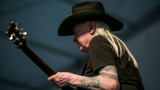 Johnny Winter performs during the 2014 New Orleans Jazz & Heritage Festival at Fair Grounds Race Course on May 3, 2014