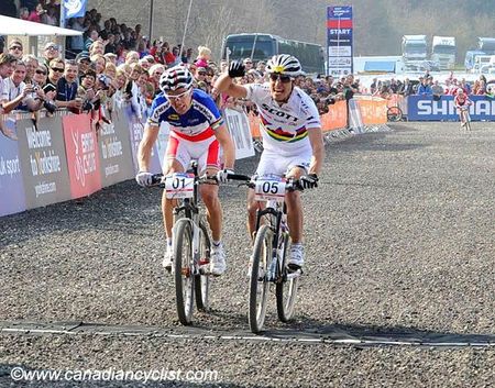 Nino Schurter nips Julien Absalon at the line.