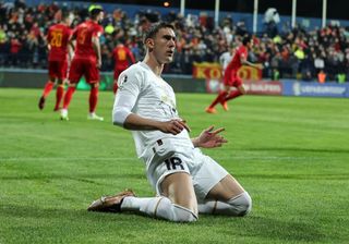 Serbia Euro 2024 squad Dusan Vlahovic of Serbia celebrates after scoring a goal during the UEFA EURO 2024 qualifying round group B match between Montenegro and Serbia at Podgorica City Stadium on March 27, 2023 in Podgorica, Montenegro. (Photo by Srdjan Stevanovic/Getty Images)
