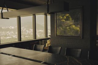 Mexico City Penthouse by Simon Hamui - large windows overlooking a city.