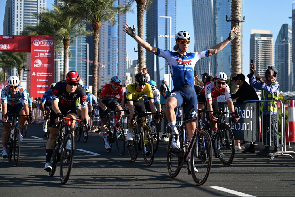 DUBAI HARBOUR DUBAI UNITED ARAB EMIRATES FEBRUARY 22 Tim Merlier of Belgium and Team SoudalQuick Step celebrates at finish line as stage winner ahead of LR Arvid de Klein of The Netherlands and Team Tudor Pro Cycling Fabio Jakobsen of The Netherlands and Team DSMFirmenich Olav Kooij of The Netherlands and Team VismaLease a Bike and Stanislaw Aniolkowski of Poland and Team Cofidis during the 6th UAE Tour 2024 Stage 4 a 168km stage from Dubai Police Officers Club to Dubai Harbour UCIWT on February 22 2024 in Dubai United Arab Emirates Photo by Tim de WaeleGetty Images