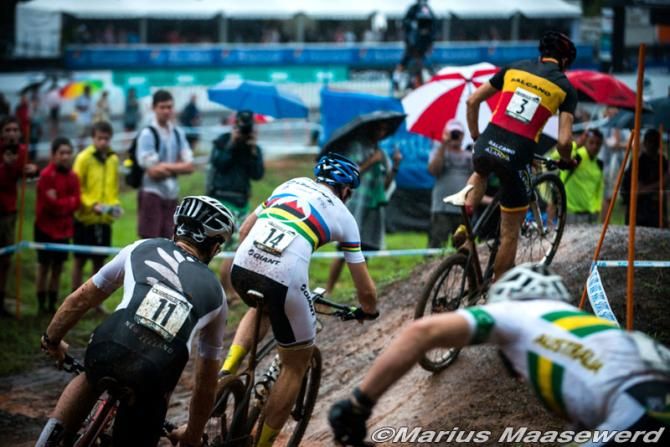 Fabrice Mels (Salcano Alanya) leads World Champ Paul van der Ploeg through a slippery corner