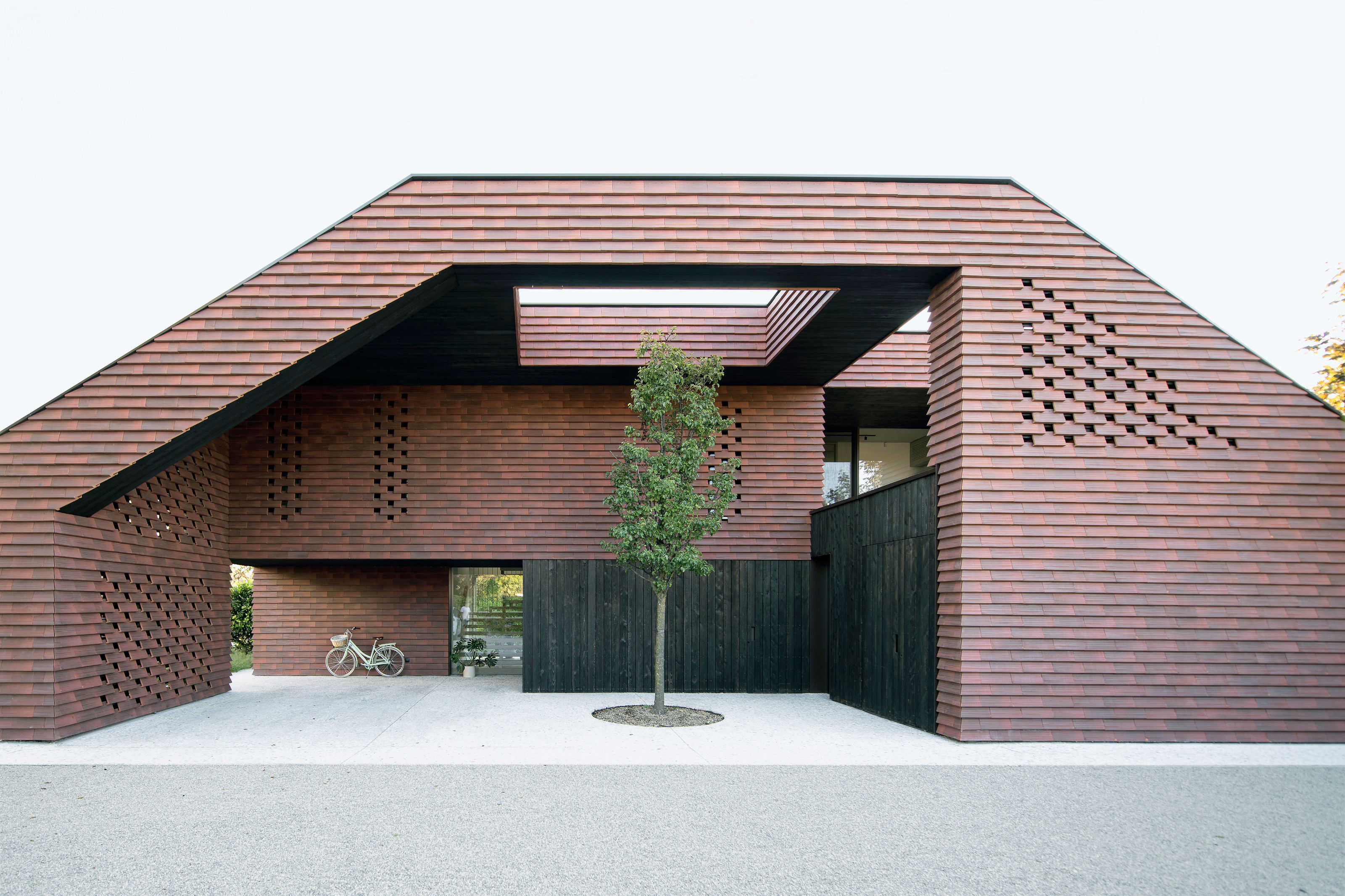 Frame House appears carved from a solid block | Wallpaper