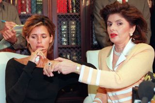 US model Kelly Fisher, 31, (L) and her attorney Gloria Allred