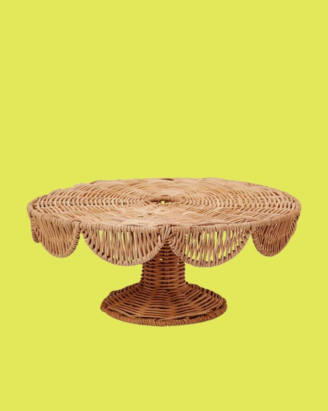 A series of sculptural rattan decorative items, including place mats, cake stands, laundry baskets, lights, napkin rings, and storage units.