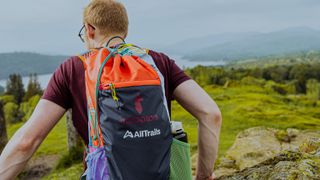 The backpack of a hiker admiring the view