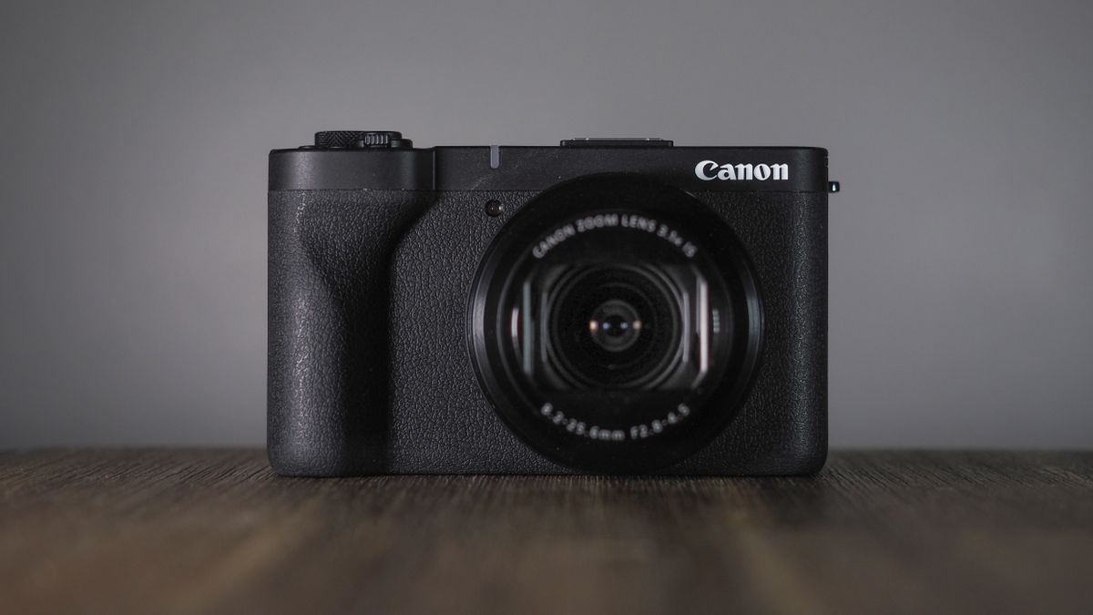 Canon PowerShot V1 on a wooden surface