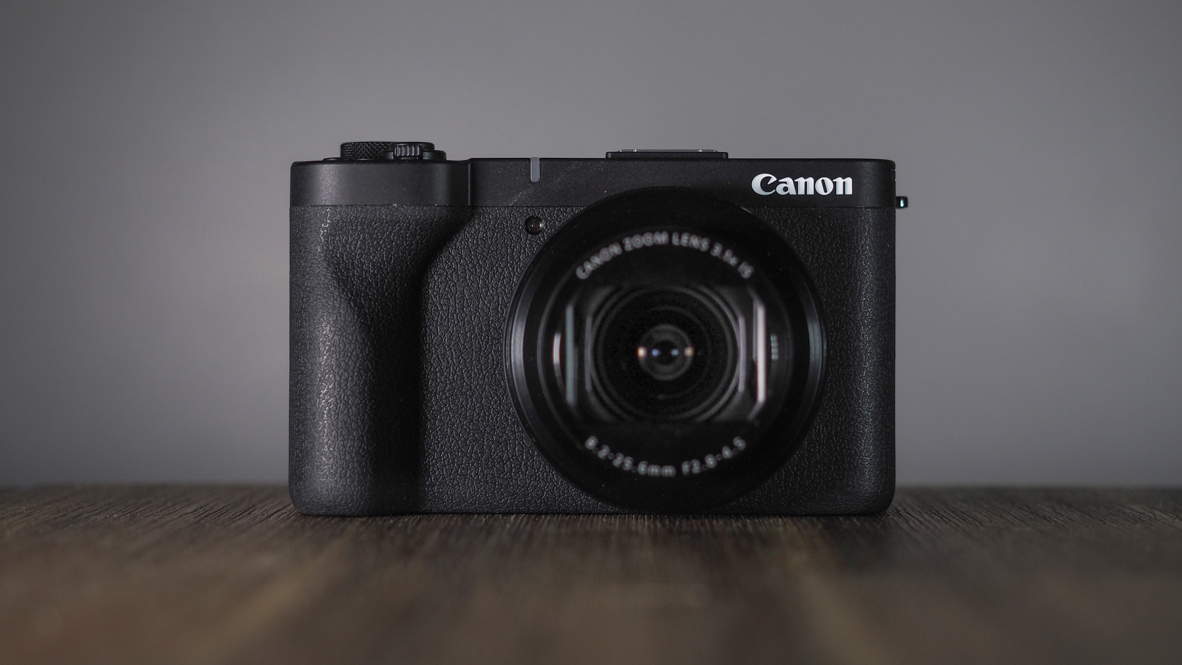 Canon PowerShot V1 on a wooden surface