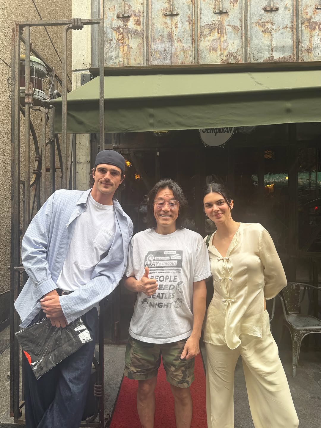 Kendall Jenner wore a pajama-inspired matching set in Tokyo with Jacob Elordi